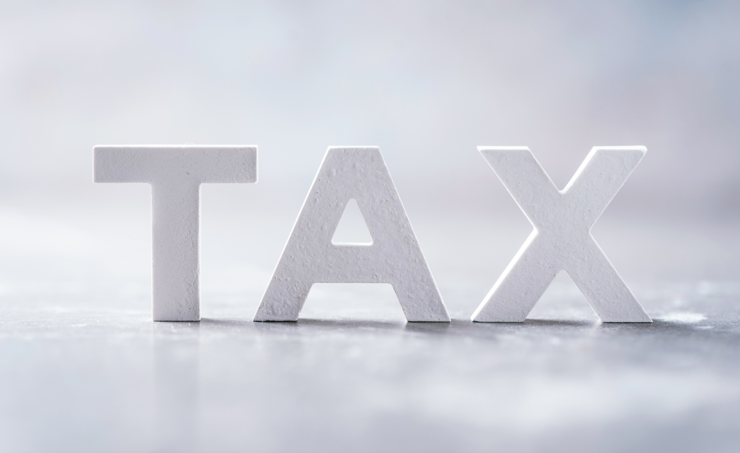 Фотографія напис англійською моваою TAX