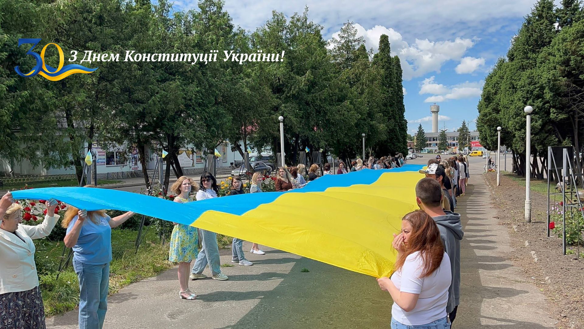 Фотографія громадяни з великим прапором